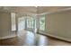 Main bedroom features hardwood floors, trey ceiling, and lots of windows at 838 Natchez Valley Trce, Grayson, GA 30017