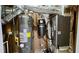 Utility space with water heater, ductwork, and mechanical equipment at 838 Natchez Valley Trce, Grayson, GA 30017