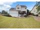 Large backyard featuring a spacious deck perfect for entertaining and outdoor enjoyment at 2000 Spicers Ln, Woodstock, GA 30189