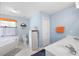 Bathroom with separate tub, double sink vanity and tile floor at 2000 Spicers Ln, Woodstock, GA 30189