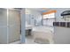 This bathroom features a relaxing soaking tub, separate shower, and a vanity area at 2000 Spicers Ln, Woodstock, GA 30189