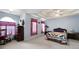 Spacious main bedroom with trey ceiling, carpet, and natural light at 2000 Spicers Ln, Woodstock, GA 30189