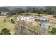 Aerial view of the estate on 5 acres, showcasing the house, outbuildings, and expansive land at 3121 Cox Cemetery Rd, Social Circle, GA 30025