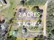 Aerial view of a 5-acre lot split into 2 and 3 acres, perfect for building your dream home or investment property at 3121 Cox Cemetery Rd, Social Circle, GA 30025