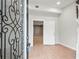 Bright foyer with hardwood floors, showcasing an open floor plan and a staircase leading to the upper level at 3121 Cox Cemetery Rd, Social Circle, GA 30025