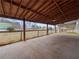 Expansive covered patio perfect for outdoor entertaining and relaxation at 3121 Cox Cemetery Rd, Social Circle, GA 30025