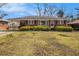 Charming single-story brick home with well-kept lawn and carport providing a blend of comfort and practicality at 965 Laurel St, Morrow, GA 30260