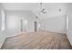 Bright bedroom features hardwood floors, a ceiling fan and a high vaulted ceiling at 2190 Leatherstone Dr, Powder Springs, GA 30127