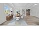 Bright dining room with stylish decor, a decorative rug, and plenty of natural light at 2190 Leatherstone Dr, Powder Springs, GA 30127
