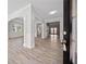 Inviting foyer showcasing elegant archways and beautiful wood-look flooring at 2190 Leatherstone Dr, Powder Springs, GA 30127