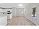 Charming kitchen adjacent to a dining area and a door leading to the backyard at 2190 Leatherstone Dr, Powder Springs, GA 30127