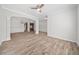 Spacious living room with beautiful flooring, elegant columns, and recessed lighting at 2190 Leatherstone Dr, Powder Springs, GA 30127