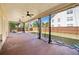 Spacious covered patio with ceiling fans and backyard access, perfect for outdoor entertaining at 2190 Leatherstone Dr, Powder Springs, GA 30127