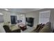 Inviting living room with modern flooring, a TV, and lots of natural light at 4252 Parkview Ct, Stone Mountain, GA 30083