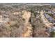 Aerial view of golf course surrounded by trees and houses at 9122 Golfview Cir, Covington, GA 30014
