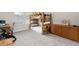 bedroom with a bunkbed, carpet flooring, dresser, and window at 9122 Golfview Cir, Covington, GA 30014