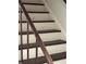Staircase featuring decorative woodwork and paint at 1110 Country Ct, Lawrenceville, GA 30044