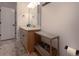 Functional bathroom featuring a single sink vanity and a large mirror, ideal for everyday routines and grooming at 6029 Shadburn Ferry Rd, Buford, GA 30518