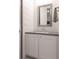 Bathroom featuring a modern vanity with stone countertops, mirror, and shiplap walls at 6029 Shadburn Ferry Rd, Buford, GA 30518