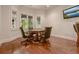 Game room with hardwood floors and a table and chairs at 6029 Shadburn Ferry Rd, Buford, GA 30518