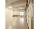 Spacious garage with ample space, featuring epoxy flooring and a boat trailer at 6029 Shadburn Ferry Rd, Buford, GA 30518