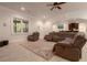 Living Room features a large seating area with windows to the outside and a large area rug at 6029 Shadburn Ferry Rd, Buford, GA 30518