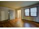 Bedroom with natural light, hardwood flooring, awaiting new decor to bring out its potential at 1347 Westmont Sw Rd, Atlanta, GA 30311