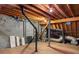 Unfinished attic space showing exposed rafters, brick wall, and ductwork, ready for customization at 238 15Th Ne St # 18, Atlanta, GA 30309