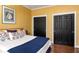 This bedroom offers hardwood floors, two closets, crown molding, and modern trim at 238 15Th Ne St # 18, Atlanta, GA 30309