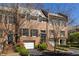 Charming brick townhome with attached garage and mature landscaping at 238 15Th Ne St # 18, Atlanta, GA 30309