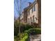 Brick townhome with charming balcony overlooking lush garden at 238 15Th Ne St # 18, Atlanta, GA 30309