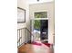 Elegant foyer with staircase and view to exterior at 238 15Th Ne St # 18, Atlanta, GA 30309