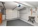 Well-organized garage featuring a workbench, storage solutions, and a durable, patterned floor at 238 15Th Ne St # 18, Atlanta, GA 30309
