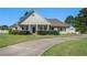 Charming one-story home boasts mature landscaping and a welcoming front porch at 950 Sundew Se Dr, Conyers, GA 30013