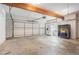 Spacious garage interior with painted walls, overhead door, and ample storage space at 950 Sundew Se Dr, Conyers, GA 30013