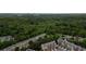 Aerial view of community with lush greenery and a marker pinpointing 1049 Brandsford St NW at 1049 Brandsford Nw St # 27-01, Atlanta, GA 30318