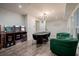 Spacious game room featuring arcade games, a poker table, and comfortable seating at 1049 Brandsford Nw St # 27-01, Atlanta, GA 30318