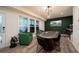 Finished game room with a poker table, vintage arcade games, and stylish décor at 1049 Brandsford Nw St # 27-01, Atlanta, GA 30318