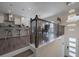 Modern interior showcases hardwood floors, open layout, and contemporary chandelier at 1049 Brandsford Nw St # 27-01, Atlanta, GA 30318