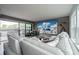 Bright living room with large sliding doors, an entertainment center, and modern furnishings at 1049 Brandsford Nw St # 27-01, Atlanta, GA 30318