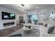 Cozy living room showcases a modern fireplace, stylish decor, and comfortable seating arrangement at 1049 Brandsford Nw St # 27-01, Atlanta, GA 30318