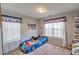 bedroom featuring a race car bed and decor at 1510 Ridgemill Ter, Dacula, GA 30019