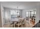 Charming dining area with a chandelier and natural light, perfect for Gathering meals and entertaining at 1510 Ridgemill Ter, Dacula, GA 30019