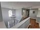 Hallway with chandelier and view of entryway at 1510 Ridgemill Ter, Dacula, GA 30019