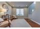 Cozy living room showcasing neutral paint, hardwood floors, and recessed lighting at 1510 Ridgemill Ter, Dacula, GA 30019