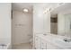 Bright bathroom featuring a double vanity, soaking tub and neutral color palette at 142 Parkside Dr, Stockbridge, GA 30281