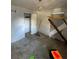 A bedroom in disrepair with boarded windows and damaged walls reflects needed renovation at 2836 Oldknow Dr, Atlanta, GA 30318