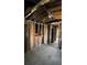 Interior framing of a room with exposed studs, electrical wiring, and insulation, awaiting renovation at 2836 Oldknow Dr, Atlanta, GA 30318