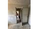View through a doorway into rooms, indicating the need for interior home renovation at 2836 Oldknow Dr, Atlanta, GA 30318