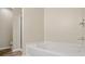 Clean bathroom features a tub and separate glass shower enclosure at 3815 Pleasant Oaks Dr, Lawrenceville, GA 30044